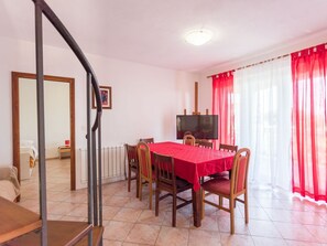 Furniture, Table, Interior Design, Wood, Flooring, Floor, Curtain, Red, Hall