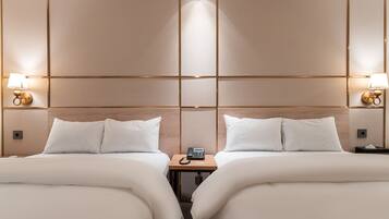 Kamar Twin Keluarga | Minibar gratis, tirai kedap cahaya, Wi-Fi gratis, dan seprai linen