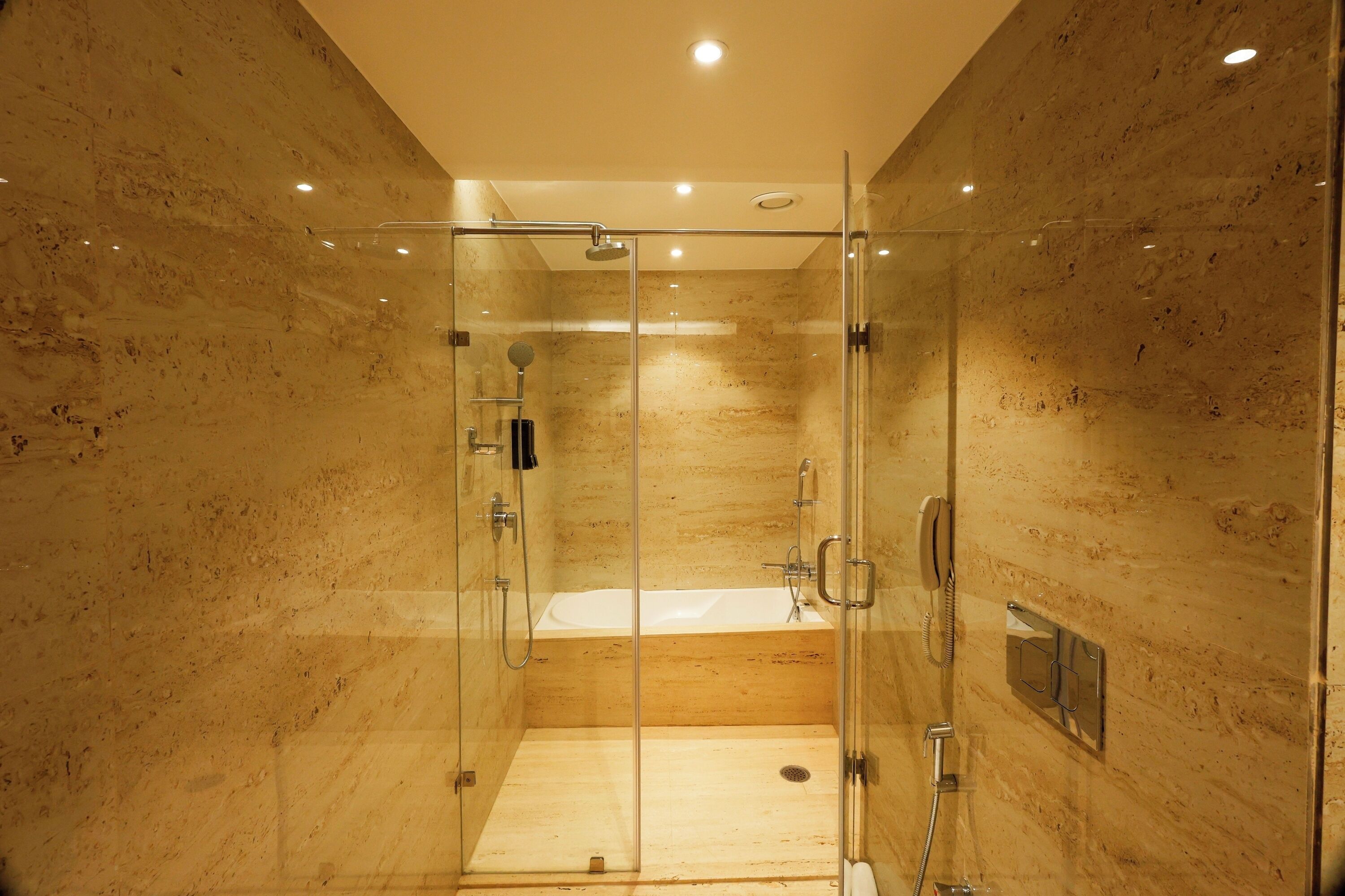 luxury suite | bathroom | shower, free toiletries, hair dryer, slippers