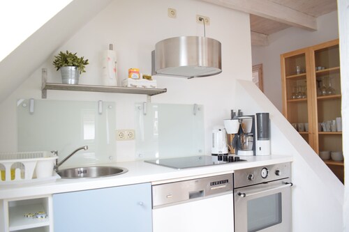 Top floor apartment in an old building, near the harbor, close to the city center