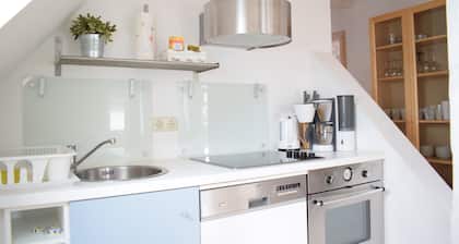 Top floor apartment in an old building, near the harbor, close to the city center