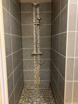 Shower, hair dryer, towels, soap