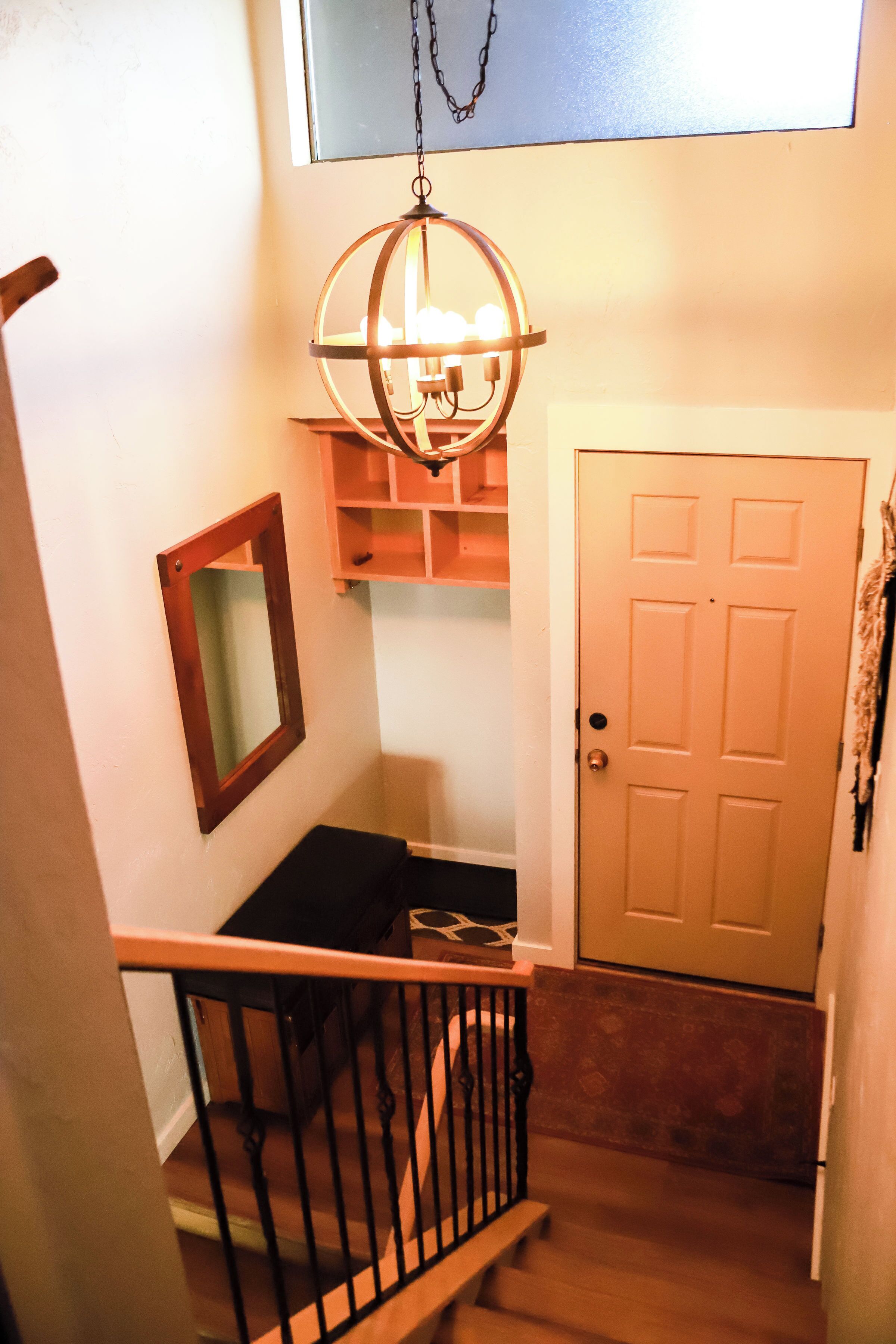 Entrance Door, Downstairs to the kitchen & living are and Upstairs to Bedrooms