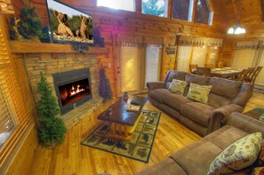 Älytelevisio, takka, videopelejä, pöytäjalkapallopöytä