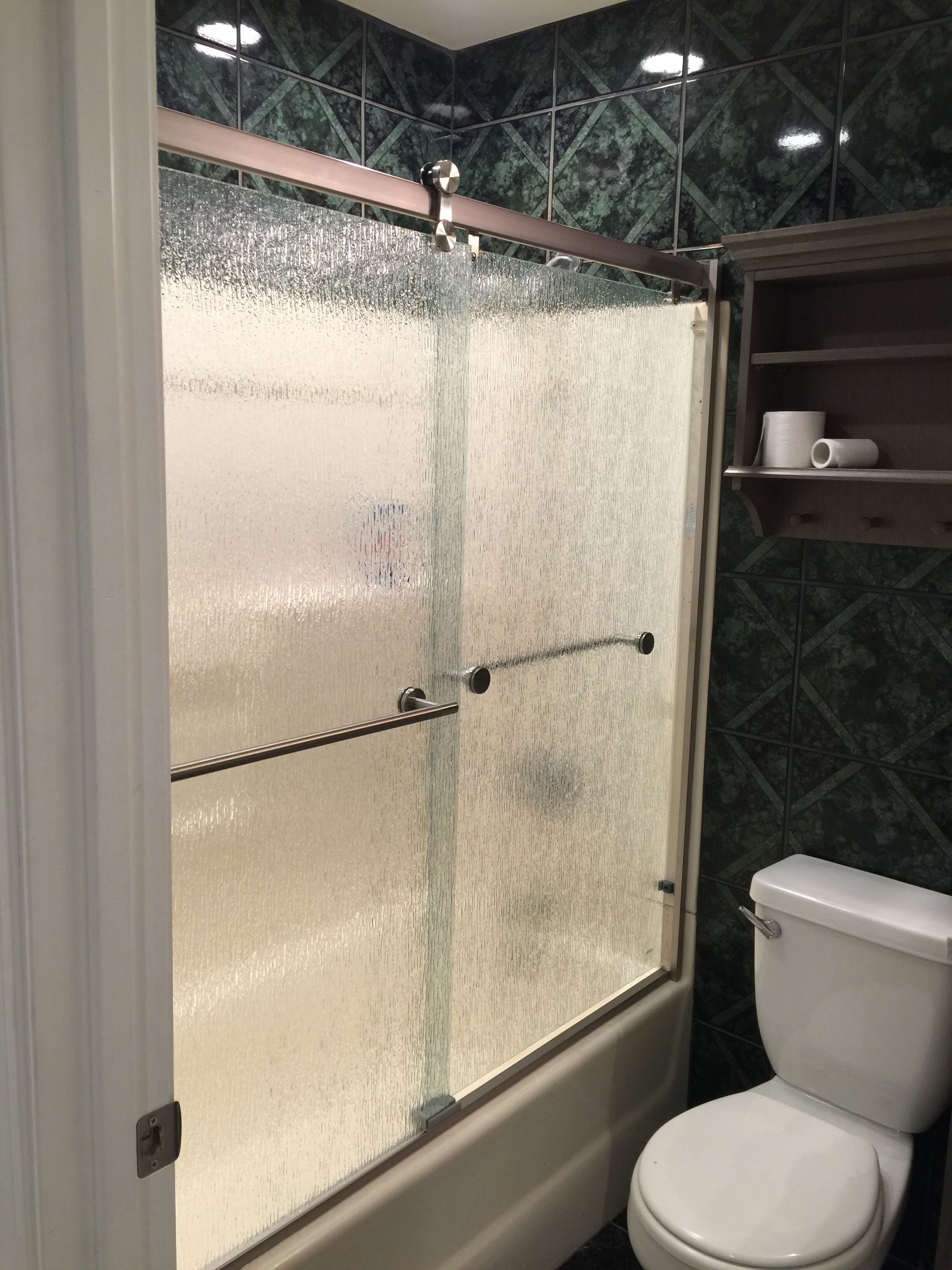 Combined shower/tub, hair dryer, towels, toilet paper