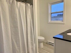 Combined shower/bathtub, towels, toilet paper - Clinton Sunset Retreat ! 3 Bedrooms 2 Bathrooms... 180 degree water views! (Clinton)