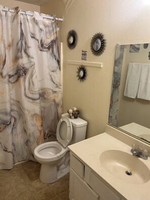 Hair dryer, towels, soap, toilet paper