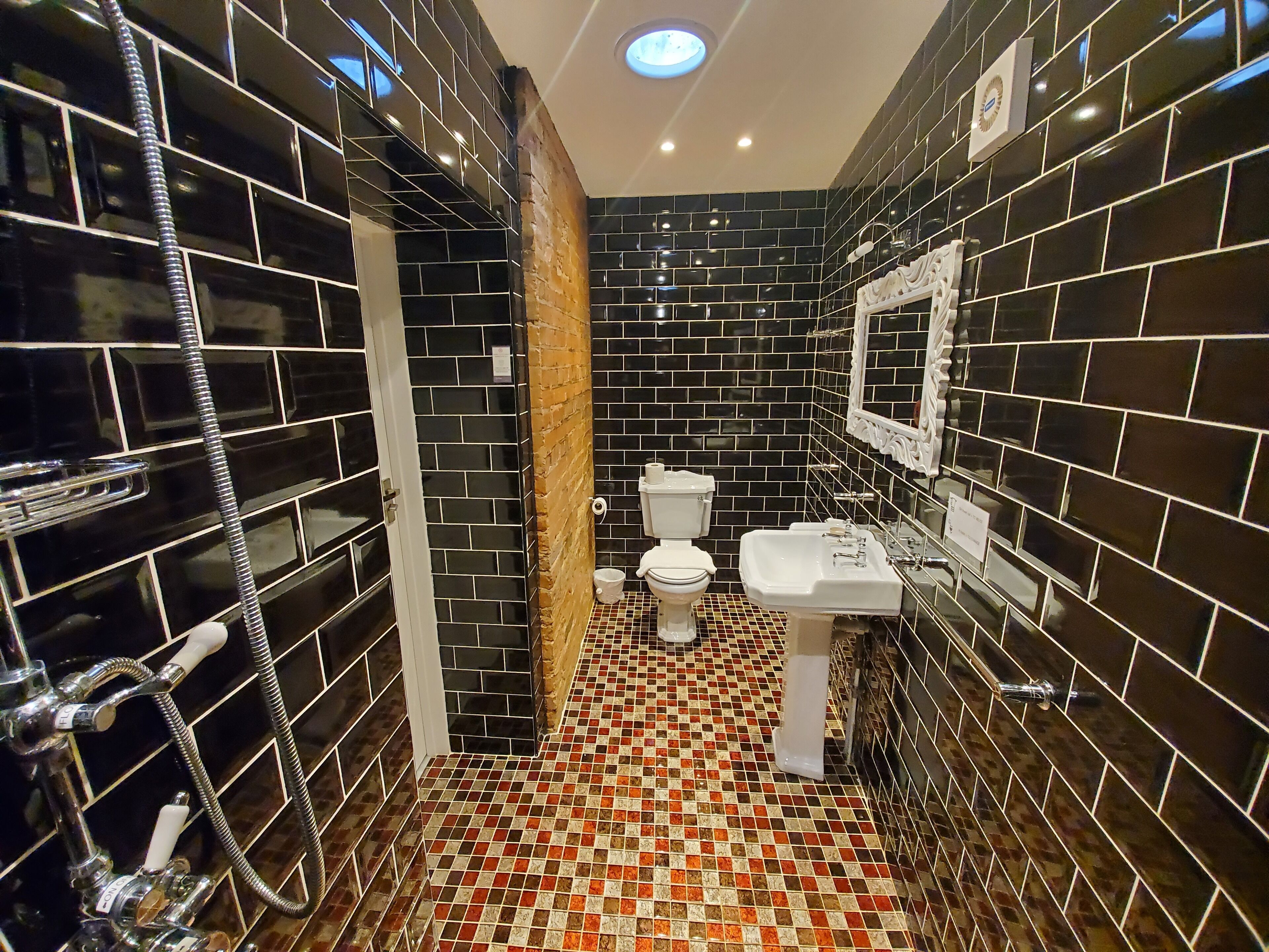 king room | bathroom | shower, free toiletries, hair dryer, towels