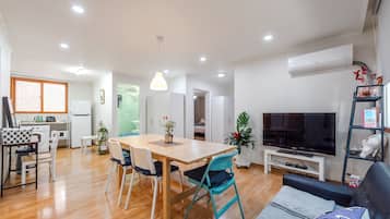 Neo House 3 | Living area | Flat-screen TV