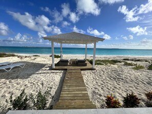 On the beach, sun-loungers
