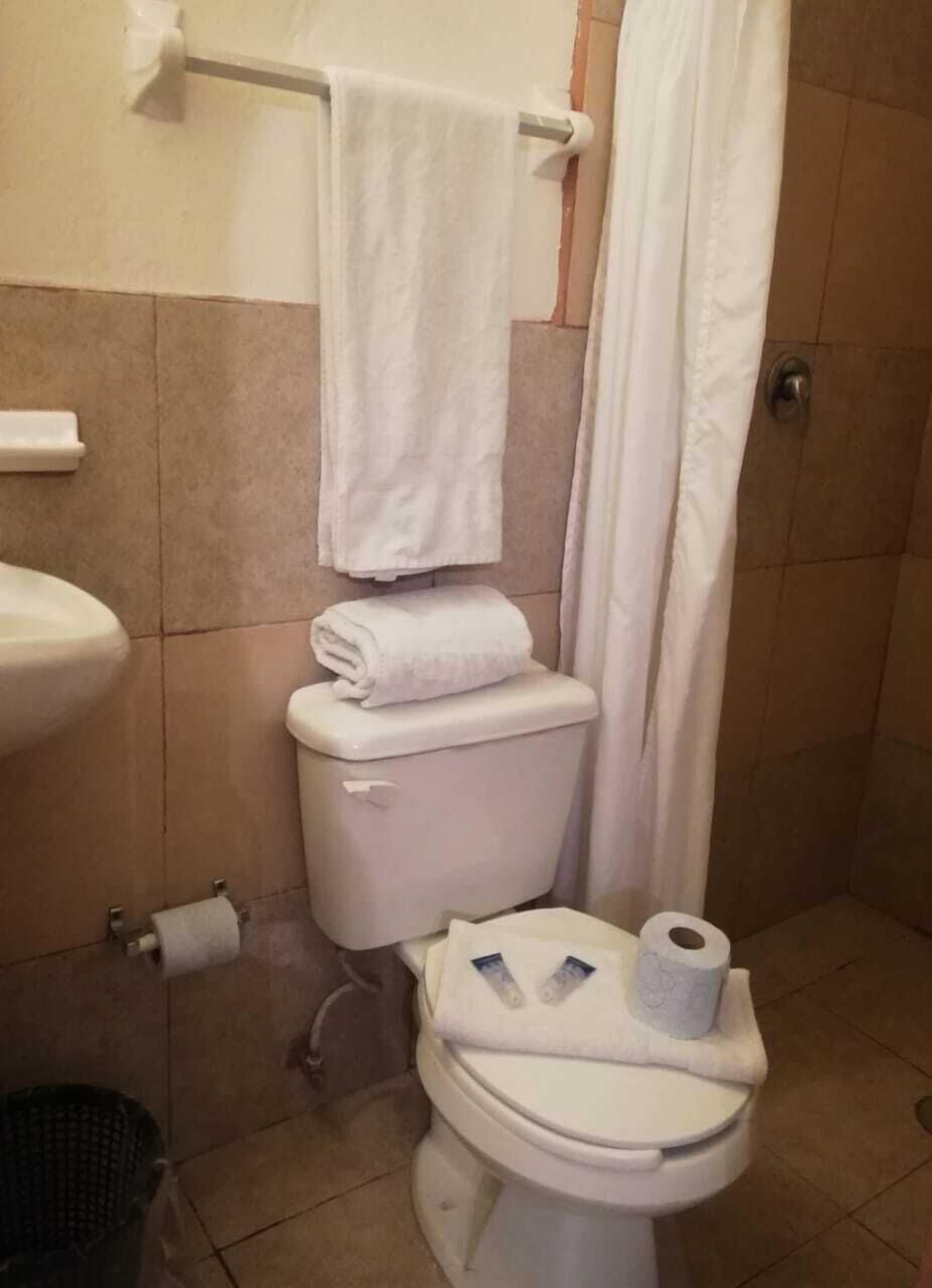 standard room | bathroom | shower, free toiletries, towels, soap