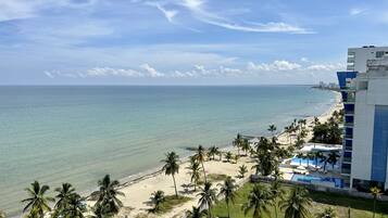 On the beach, sun loungers