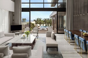 Monogram 4 bed room Beachfront Villa | Living room | 32-inch Smart TV with cable channels, TV, toys