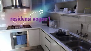 Loft | Private kitchen | Full-sized fridge, microwave, stovetop, cookware/dishes/utensils - Residensi Vogue 1 KL Eco City (Kuala Lumpur)