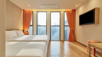 Deluxe Family Twin + Netflix (Personal ID use) | Premium bedding, soundproofing, free WiFi, bed sheets