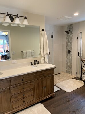Bathtub, hair dryer, towels, soap