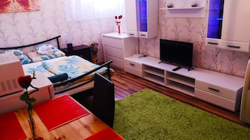 Studio | Woonruimte | Een flatscreentelevisie