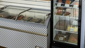 A seafood display case with various packaged fish products labeled 'FISHERMAN'. - Fisherman Hótel Suðureyri (Sudureyri)
