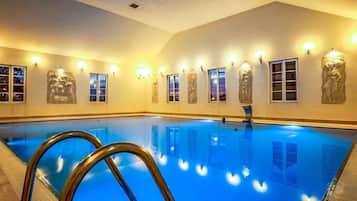 Indoor pool, open 7:00 AM to 10:00 PM, pool loungers