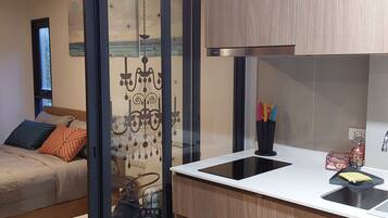 Fridge, microwave, stovetop, coffee/tea maker