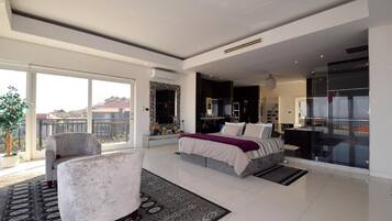 Basic Penthouse, 4 Bedrooms | Individually decorated, individually furnished, laptop workspace