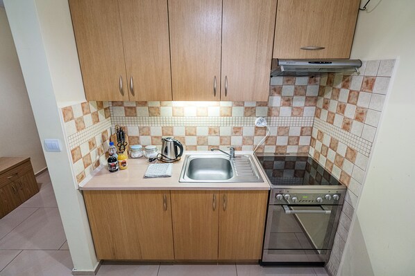 商务公寓 | 私人厨房 | 冰箱、炉灶、茶具/咖啡用具、电热水壶