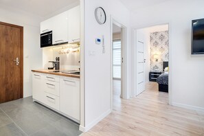 Superior Apartment | Private kitchen | Fridge, electric kettle, dining tables