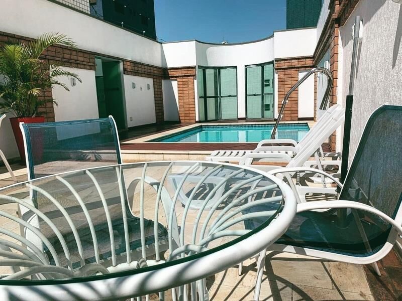 Outdoor pool, open 7:00 AM to 10:00 PM, pool umbrellas, pool loungers