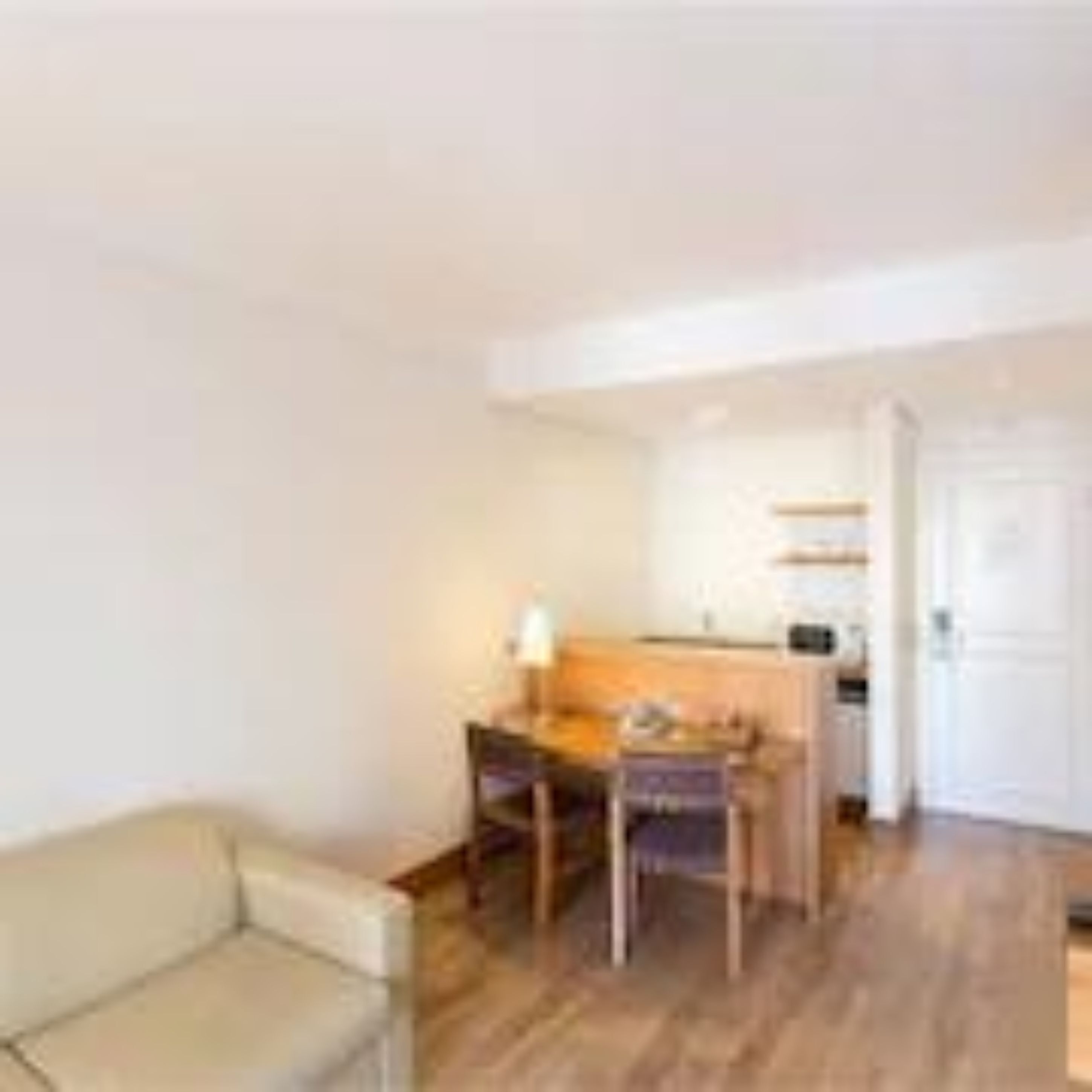 classic suite | in-room safe, desk, laptop workspace, blackout curtains