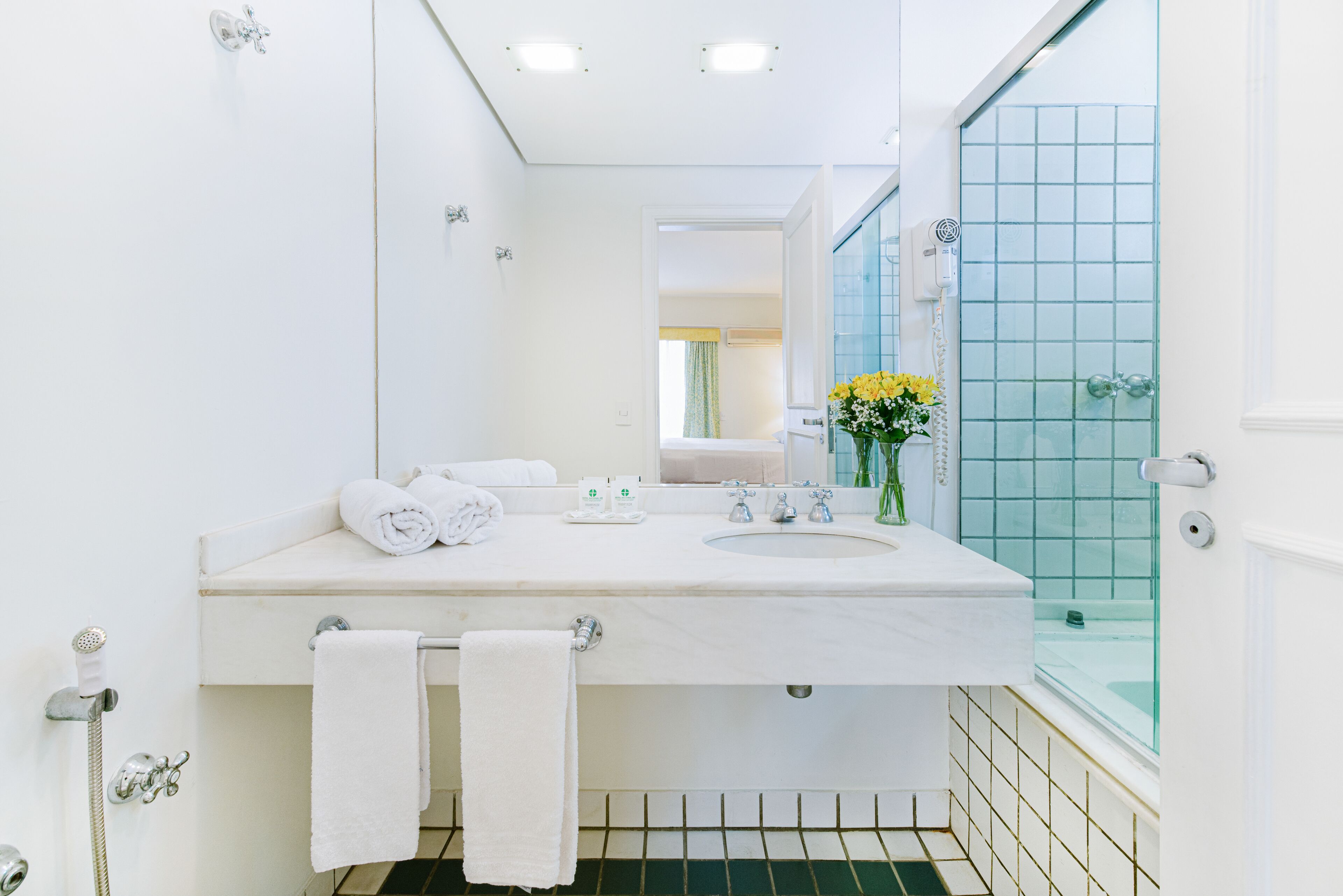 deluxe suite, 1 queen bed | bathroom | hair dryer, towels, soap, shampoo