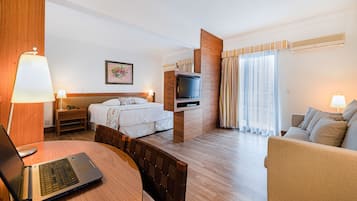 Superior Studio Suite, 1 Queen Bed (Studio) | In-room safe, desk, laptop workspace, blackout curtains