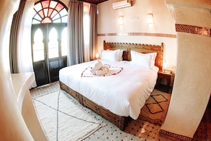 Suite superior | Ropa de cama de alta calidad y edredones de plumas