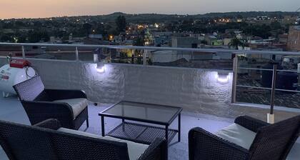 New modern home with parking onsite. Walking disctance from the center plaza