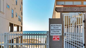 A gated entrance to a private beach area with a sign indicating access is for enclave community and Terra Cotta owners and guests only. - January Beach Bliss for 2 OR 4!  Beach, Sunsets, pool, tennis!  US Senic 98 (Destin)