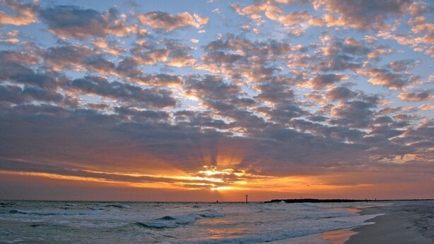A beach with waves and a sunset. - January Beach Bliss for 2 OR 4!  Beach, Sunsets, pool, tennis!  US Senic 98 (Destin)
