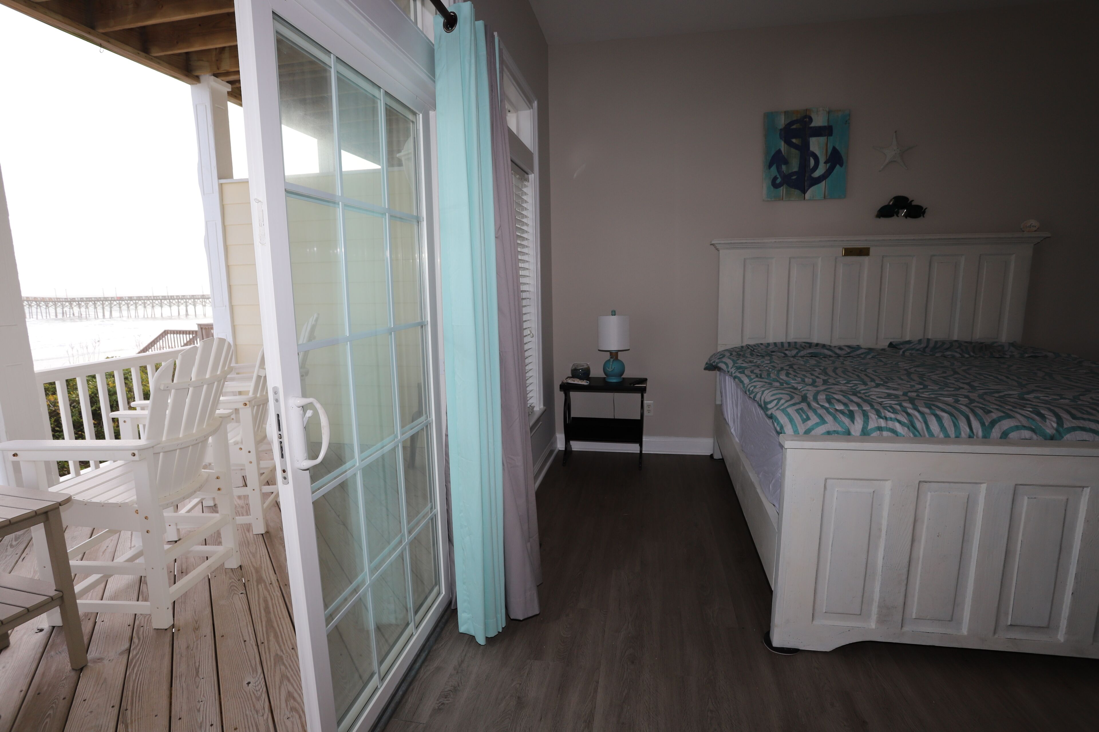 Ocean front master with private walk out deck with seating for 4 