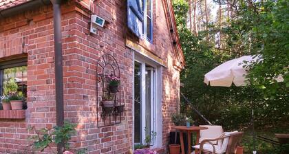 Modernized stable with comfort and flair between forest and lake