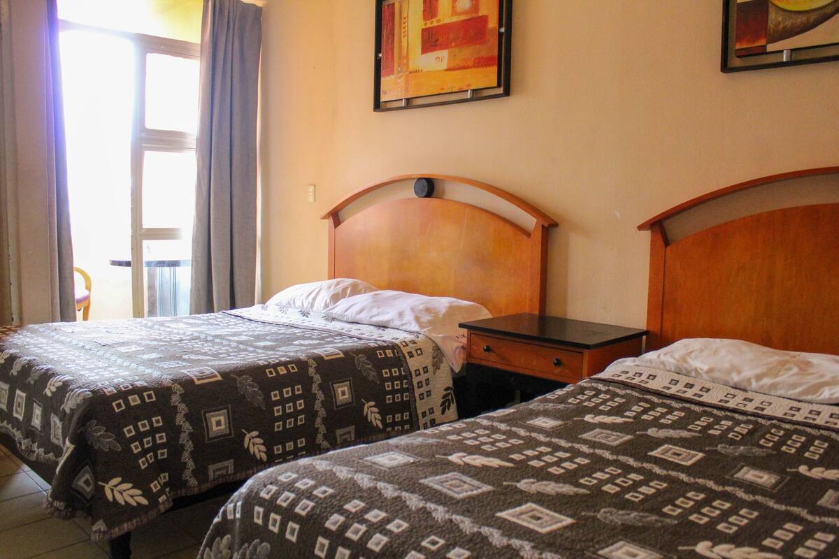 Standard Room, 2 Double Beds | WiFi (free), bed sheets