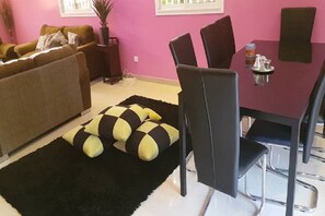 Basic Villa, 1 Double Bed | Living area | 43-inch flat-screen TV with satellite channels, TV