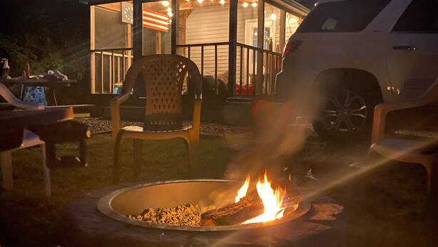 A house with a covered patio, a fire pit, and outdoor seating. - Perfect Family Escape! Walk to everything and relax. It’s all here for you  (York)