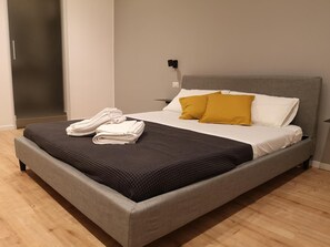 Premium bedding, memory-foam beds, desk, soundproofing