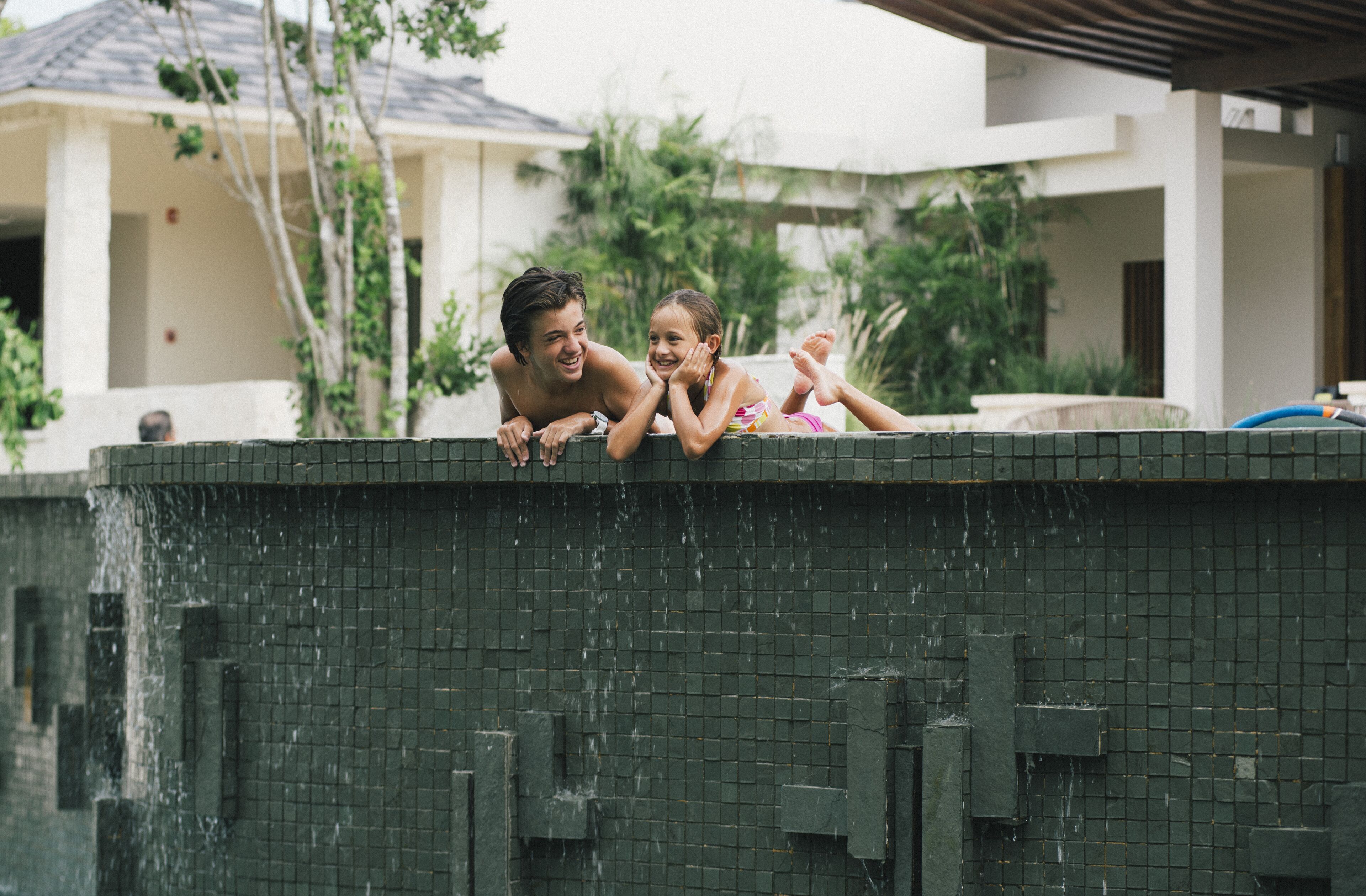 2 outdoor pools, open 7:00 AM to 7:00 PM, pool umbrellas