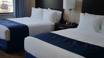 Premium bedding, down comforters, pillowtop beds, in-room safe