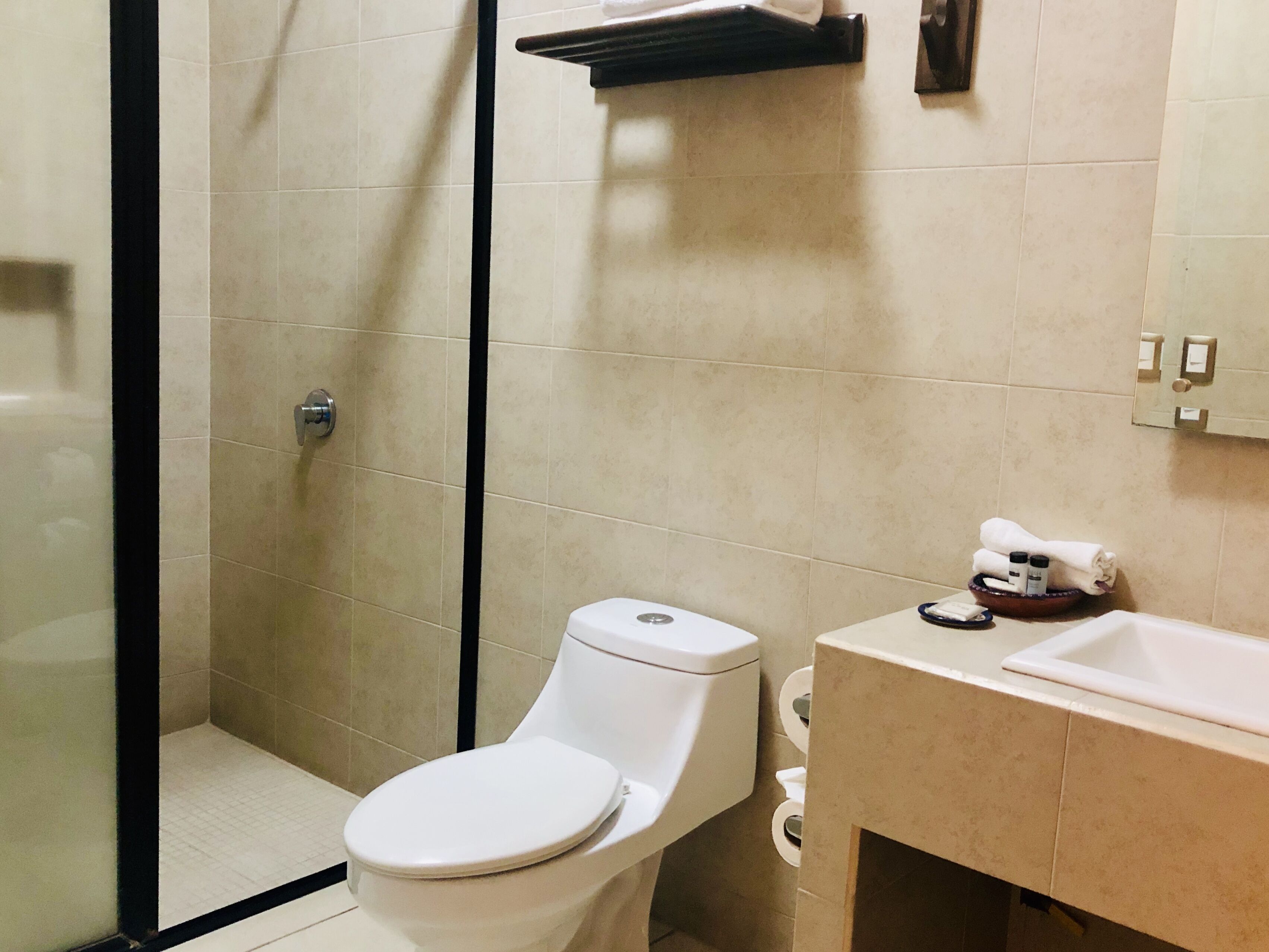 basic quadruple room | bathroom | shower, towels, soap, shampoo