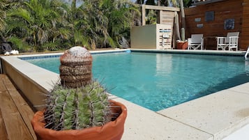 Outdoor pool, open 8:00 AM to 10:00 PM, sun loungers