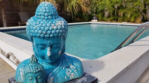 Outdoor pool, open 8:00 AM to 10:00 PM, sun loungers