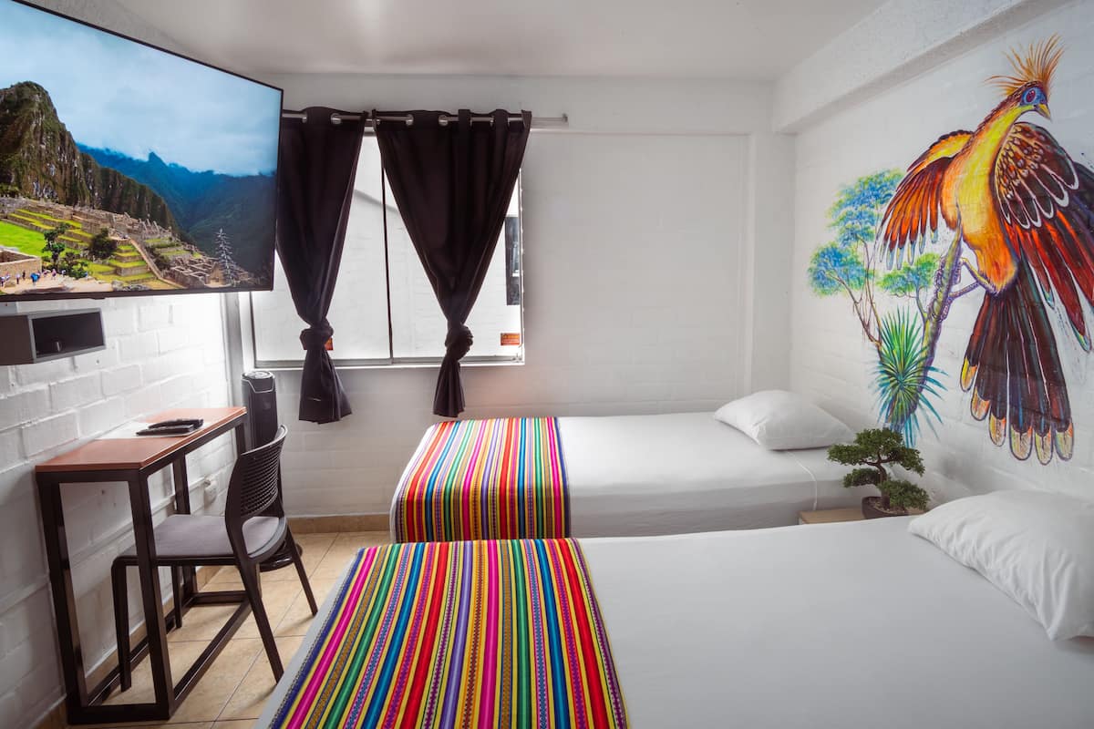 Twin Room | 1 bedroom, blackout drapes, iron/ironing board, free WiFi