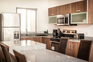 Microwave, stovetop, coffee/tea maker, toaster