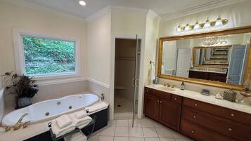 Combined shower/tub, hair dryer, towels, soap