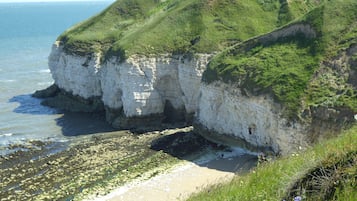 Beach nearby, sun loungers